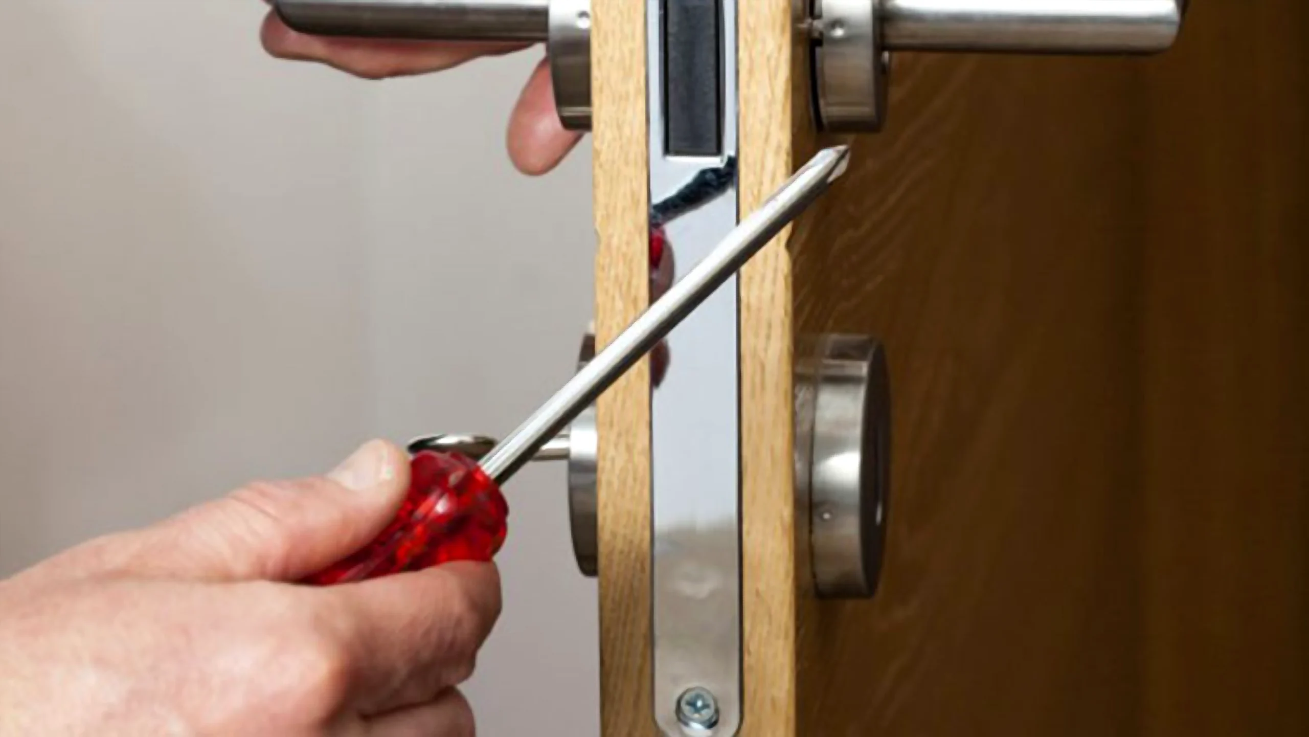 Mobile locksmith Echo Park technician unlocking a car door beside a service van