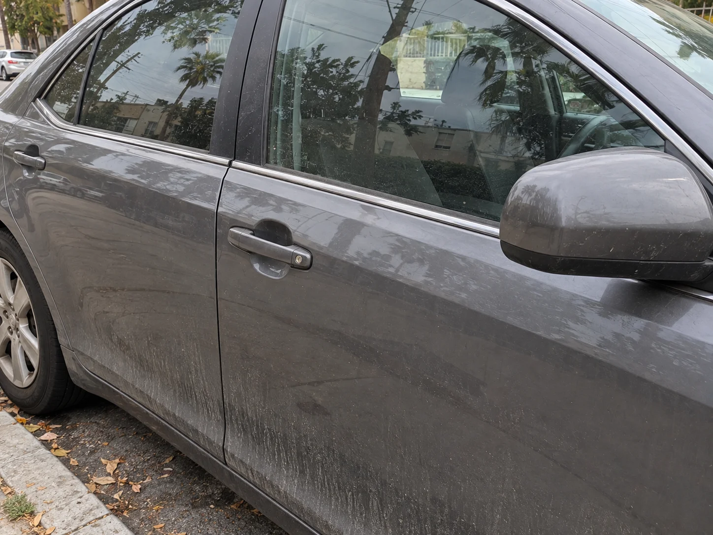 Car keys inside a locked vehicle before a car lockout call